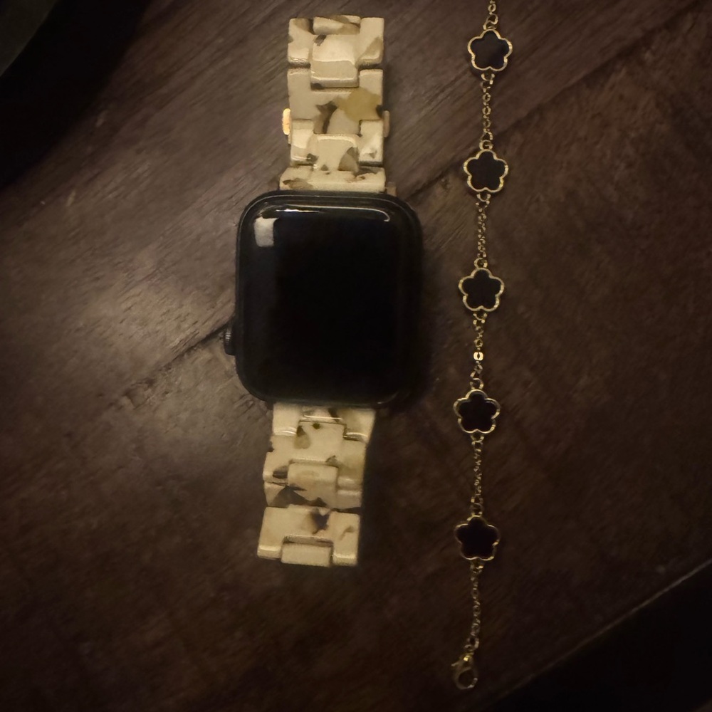 Stylish Watch with Camouflage Band and Gold Bracelet